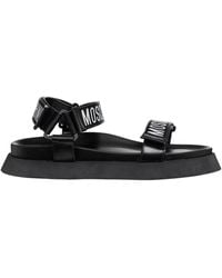 Moschino - Flat Sandals - Lyst