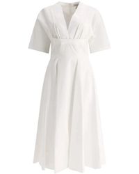 Alaïa - Kleedjes ,Wit ,Katoen Katoenen Midi Jurk V-Hals Korte Mouw - Lyst