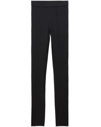Filippa K - Pantalones negros de tela elástica con cinturilla logo - Lyst