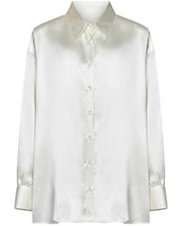 ARMARIUM - Weiße seiden oversized bluse mit perlmuttknöpfen - Lyst