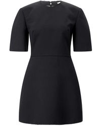 Givenchy - Kleedjes ,Zwart ,Wol Wollen Mini Jurk Met Moderne Elegantie - Lyst