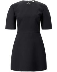 Givenchy - Kleedjes ,Zwart ,Wol Wollen Mini Jurk Met Moderne Elegantie - Lyst