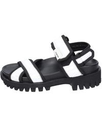 Stokton - Flat Sandals - Lyst