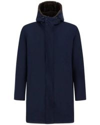 Herno - Blauwe Parka Jas Met Nep Bont Capuchon - Lyst