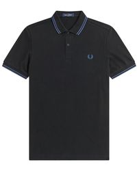 Fred Perry - Slim fit twin tipped polo in schwarz/midnight blue - Lyst