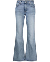 Ganni - Flared jeans - Lyst