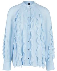 Marc Cain - Zeitlose eleganz: blaue bluse mit volants und glänzenden knöpfen - Lyst