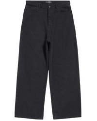 Balenciaga - Schwarze denim jeans mit logo patch - Lyst