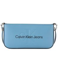 Calvin Klein - Borsa a spalla in ecopelle con logo impresso - Lyst