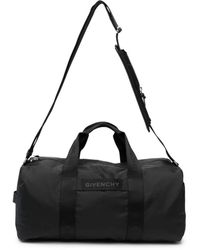 Givenchy - Schwarze logo-tape reisetasche mit reißverschluss - Lyst