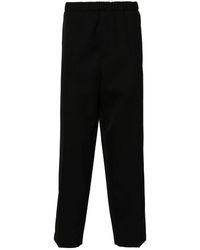 Jil Sander - Schwarze wolltexturierte tapered leg hose - Lyst