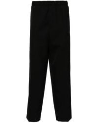 Jil Sander - Zwarte Wollen Broek Met Textuur En Taps Toelopende Pijpen - Lyst
