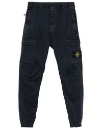 Stone Island - Blauwe Cargo Broek Met Ritszakken - Lyst