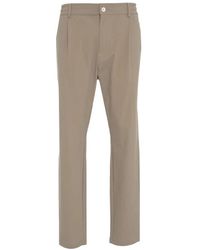 Cruna - Braune tapered fit hose mitte stil - Lyst