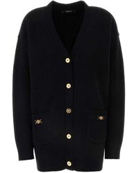 Versace - Stilvolle schwarze wollmischung strickjacke - Lyst
