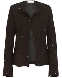 Chloé - Chaqueta de cuero en patchwork con mangas trompeta - Lyst