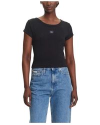 Calvin Klein - Tops ,Zwart ,Katoen Zwarte Ronde Hals T-Shirt Voor Vrouwen - Lyst