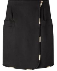 Genny - Short Skirts - Lyst