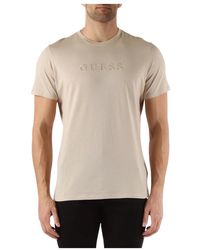 Guess - T-shirt slim fit in cotone con ricamo logo frontale - Lyst