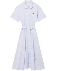 Lacoste - Kleedjes ,Blauw ,Katoen Flared Petit Piqué Polo Jurk - Lyst