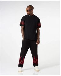 Vision Of Super - T-shirts,schwarzes t-shirt mit roten flammen - Lyst