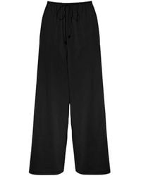 Wolford - Wide Trousers - Lyst