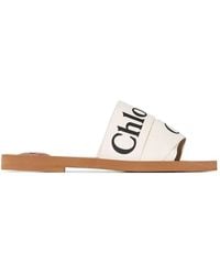 Chloé - Mules plates ligneuses - Lyst