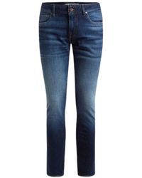 Guess - Slim-fit denim jeans für männer - Lyst