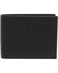 Ferragamo - Accessoires ,Zwart ,Leer Monogram Embossed Bi-Fold Portemonnee - Lyst