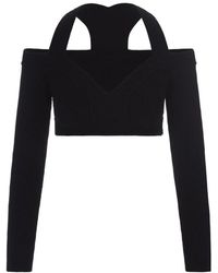 McQueen - Stilvolles schwarzes crop top mit cut-out design - Lyst