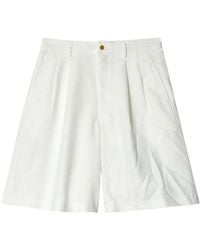 Comme des Garçons - Shorts ampia gamba con pieghe in bianco - Lyst