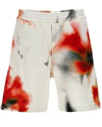 McQueen - Obscured Flower Bermuda Shorts - Lyst