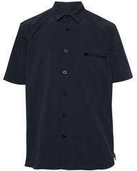 Sacai - Camicia blu in poliestere con colletto bowling e tasca con zip - Lyst