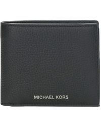 Michael Kors - Portafoglio libro in pelle nera grain - Lyst