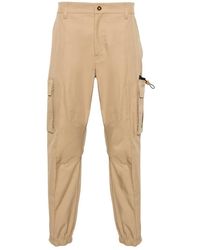 Versace - Trousers > slim-fit trousers - Lyst
