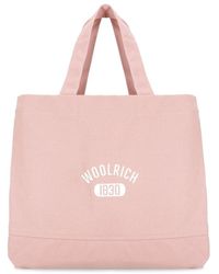 Woolrich - Rosa baumwoll-schultertasche mit logo - Lyst