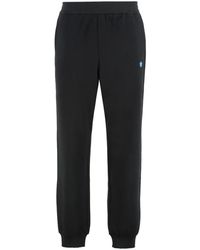 Versace - Broeken ,Zwart ,Katoen Katoenen Trainingsbroek Met Geribbelde Boorden - Lyst