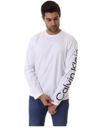 Calvin Klein - Langarm t-shirt mit bequemer passform und logo - Lyst