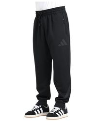 adidas - Fitness ,Zwart ,Katoen Teamwork Geïnspireerde Sportbroek - Lyst