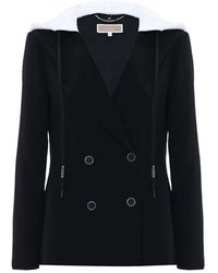 Kocca - Doppelreihige jacke mit kapuze und metallverzierung - Lyst