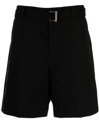 Sacai - Shorts neri con fibbia logo - Lyst
