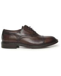 Sturlini - Flache Schnürschuhe - Lyst