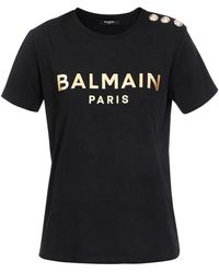 Balmain - T-Shirt aus Baumwolle mit goldfarbenem Logo-Print - Lyst