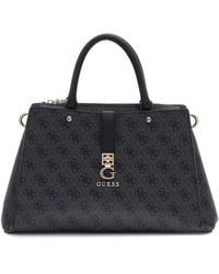 Guess - Handbags - Lyst