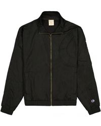 Champion - Jassen ,Zwart ,Zwarte Geborduurde Logo Bomberjack - Lyst