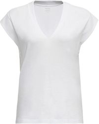 FRAME - T-shirt bianca con scollo a v in cotone maniche corte - Lyst