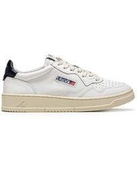 Autry - Weiße sneakers mit blauem absatz - Lyst