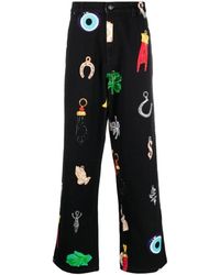 Sky High Farm - Schwarze high-waisted jeans mit grafikdruck - Lyst