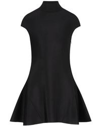 Givenchy - Kleedjes ,Zwart ,Wol Mini Jurk Met Uitlopende Rok - Lyst