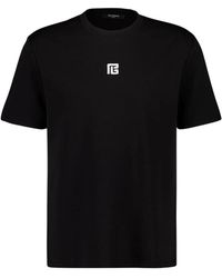 Balmain - Tops ,Zwart ,Katoen Regular Fit T-Shirt Met Klein Logo - Lyst
